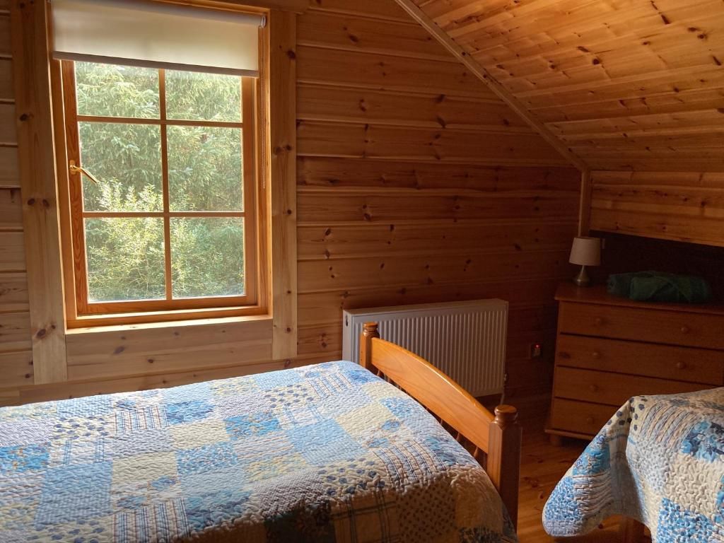Дома для отпуска Riverside log cabin Балликоннелл